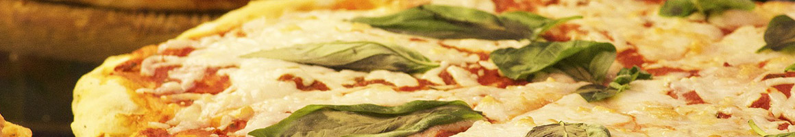 Eating Pizza at Big C's Downtown Pizzeria restaurant in Fort Lauderdale, FL.